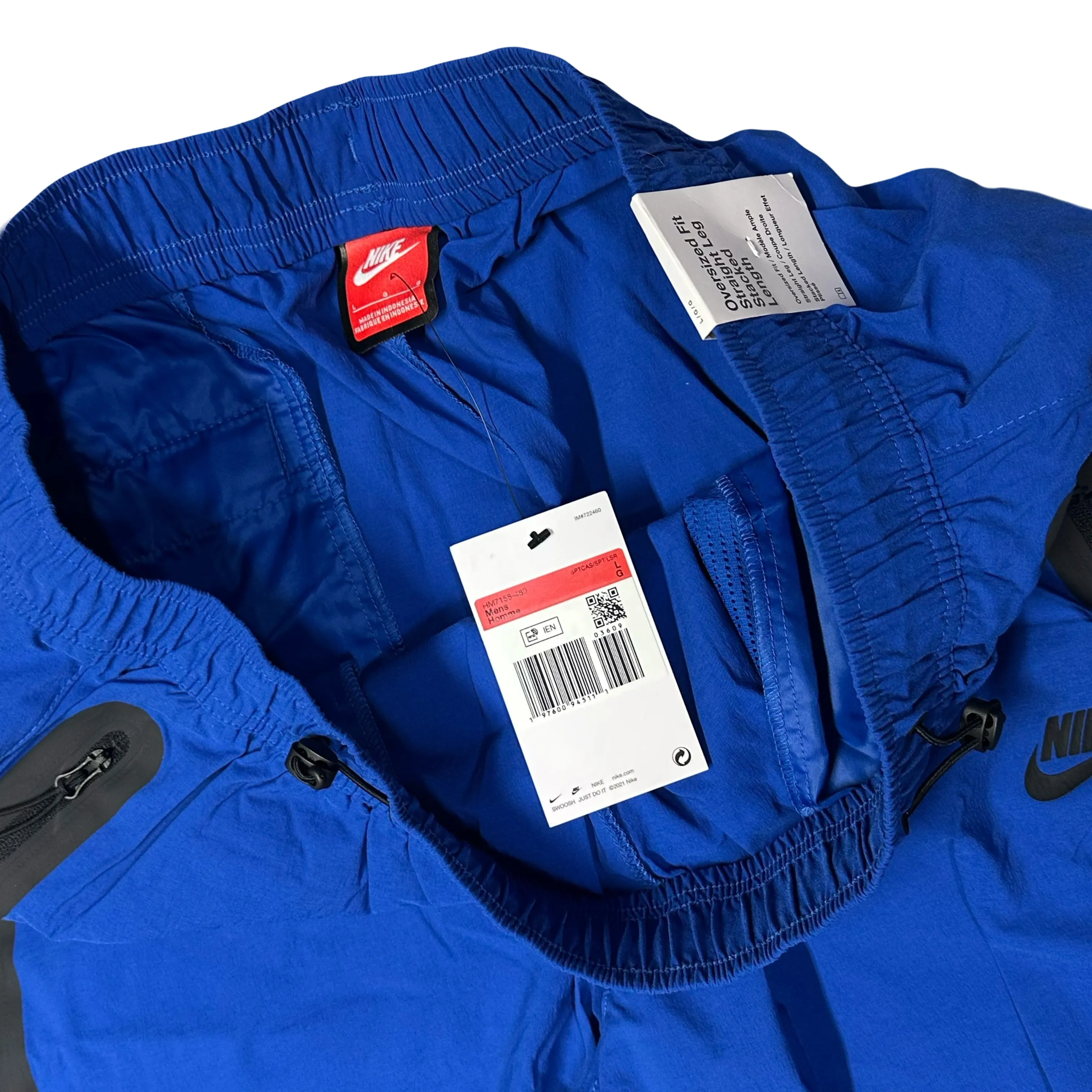 Nike Woven Tech Loose Fit Bottoms In Blue ( L )